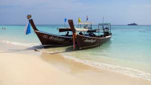 Longtail boats on the beach at Ko Rok