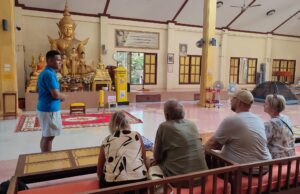 English speaking guide at buddhist temple in Old Town