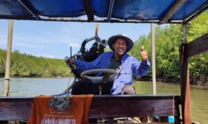 Friendly boat captain on the longtail trip through the mangroves at Tung Yee Peng